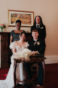 Formal group photo during signing of the wedding register