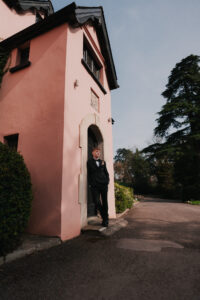 Wide portrait of groom, getting ready