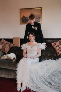 Candid moment between the bride and groom at Newport Registry Office