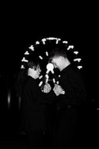 Bride and groom candid moment at Cardiff Bay, black-and-white