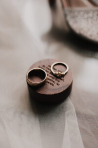 Close up of wedding bands in soft light