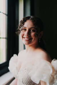 Portrait of bride smiling in natural light at Ramada Resort