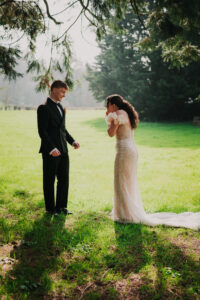 Candid moment of bride's excitement with groom