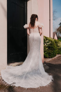 Back of bride's dress in shade at Wyndham Cwrt Bleddyn