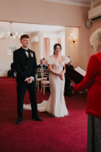 Excited bride and groom at wedding ceremony