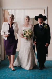 Bridal entrance at Jubilee Church Grantham with parents