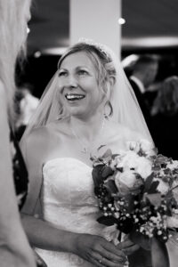 Bride laughing after wedding ceremony