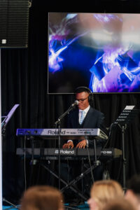 Keyboard player during the worship section of the service