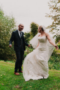 Candid laughter between the bride and groom during portraits