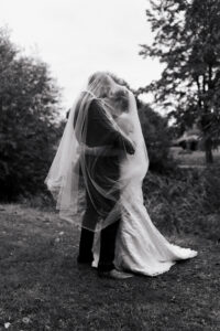 Intimate portrait of the couple under the veil