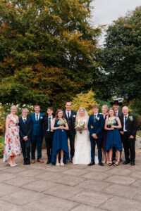 Formal wedding group photo in Wyndham Park, Grantham