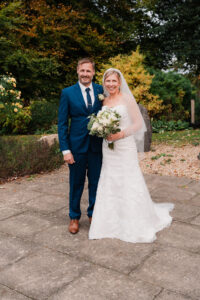Wedding portrait of bride with her brother