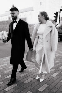 Candid moment between the bride and groom at Cardiff Castle
