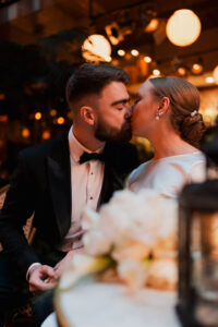 Bride and groom share a kiss in the Cardiff Arcade