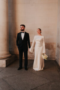 Side on wedding portrait at the museum
