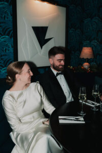 Unposed moment of bride and groom laughing in Cardiff Townhouse