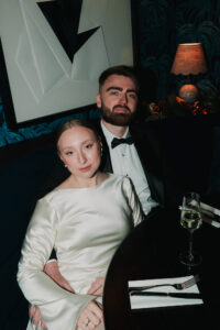 Formal pose of bride and groom, direct flash