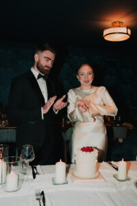 Candid moment of bride and groom celebrating in Coppa Club Cardiff