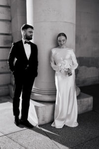 Black-and-white portrait of wedding couple at Cardiff Museum