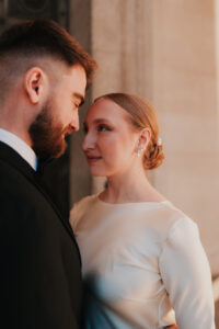Bride looking intently into groom's eyes