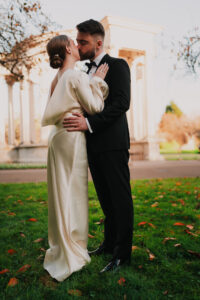 Bride and groom kissing at Alexandra Gardens