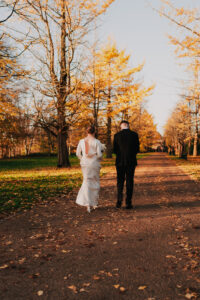 Bride and groom walking together, candid shot