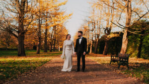 Wide portrait of bride and groom in Bute Park