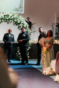 Groom's reaction to seeing bride down the aisle in Warehouse Church