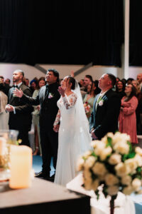 Worship at Warehouse Church during wedding service