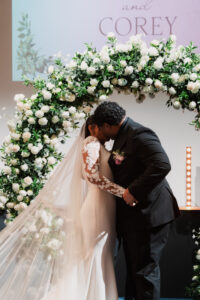 First kiss of bride and groom at Warehouse Church