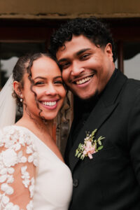 Portrait of bride and groom smiling together in Newport, South Wales