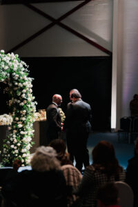 Groom prays before service at Warehouse Church