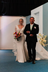 Bride walking down the aisle Warehouse Church