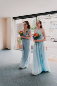Bridesmaids walking down the aisle at Waterloo Road Church