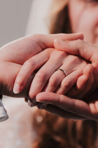 Close up detail shot of the bride's wedding ring