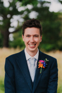 Solo portrait of groom at The Great Barn, Ruislip London